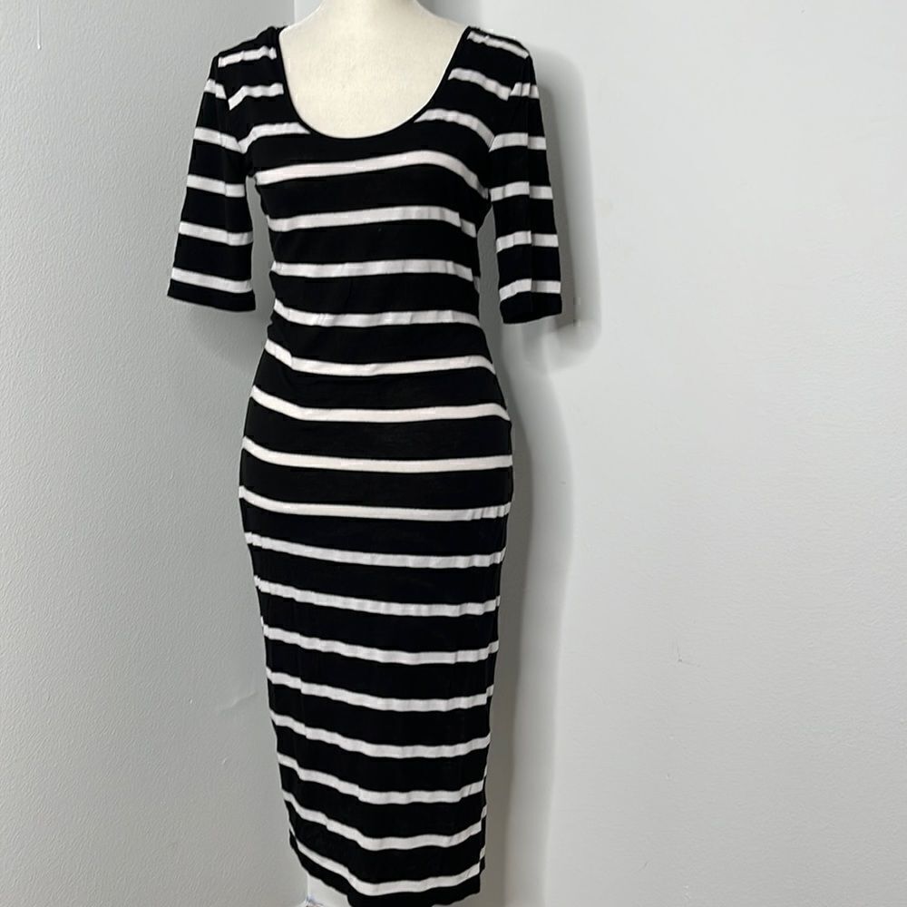 Forever 21 T-shirt dress.  Mesh back. Size Small. Black and white striped.